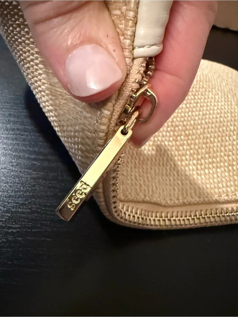 Seed Heritage cream & tan woven pouch with initial H. Gold hardware and initial.